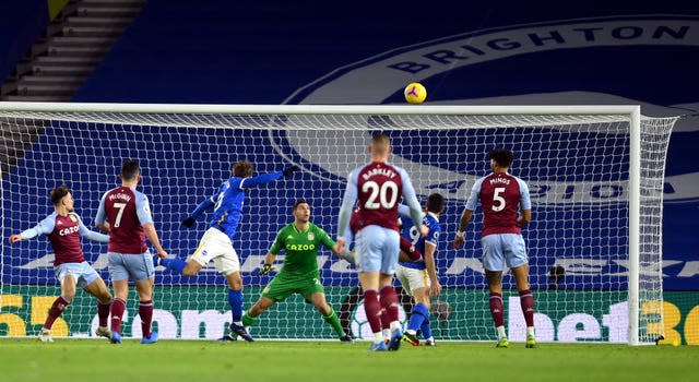 Alexis Mac Allister heads over the crossbar for the hosts