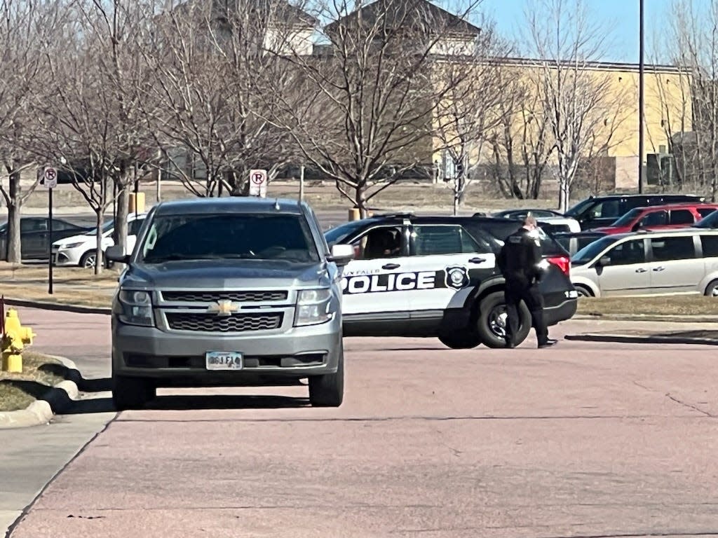 Sioux Falls Police Department officers and South Dakota Highway Patrol respond to a developing situation Thursday, April 4, 2024, near Cayman Court Assisted Living Facility in the 4100 block of W. Cayman Street in Sioux Falls.