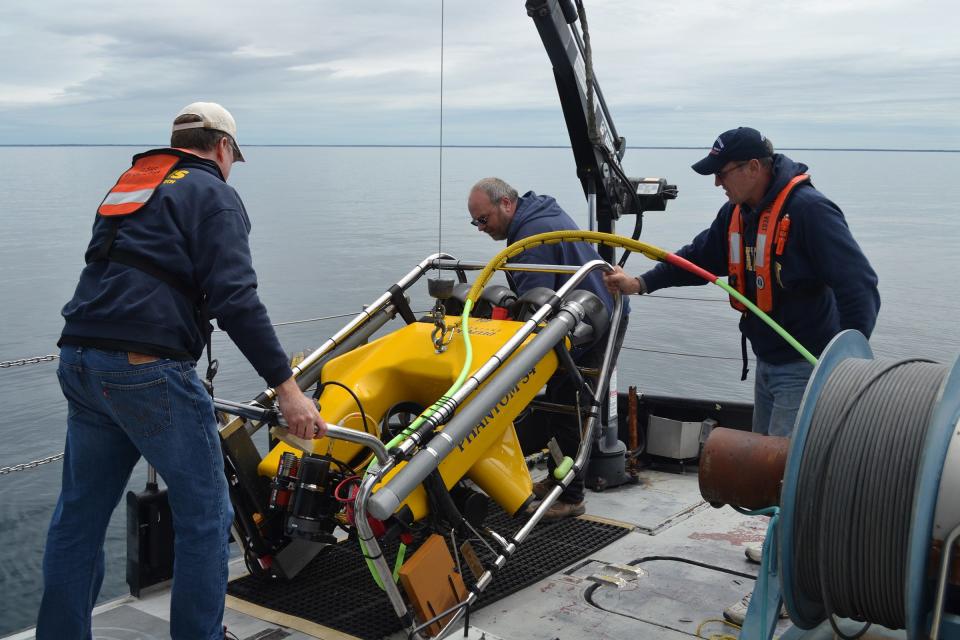 Members of the Great Lakes Shipwreck Historical Society deploy an ROV to explore a potential shipwreck site.