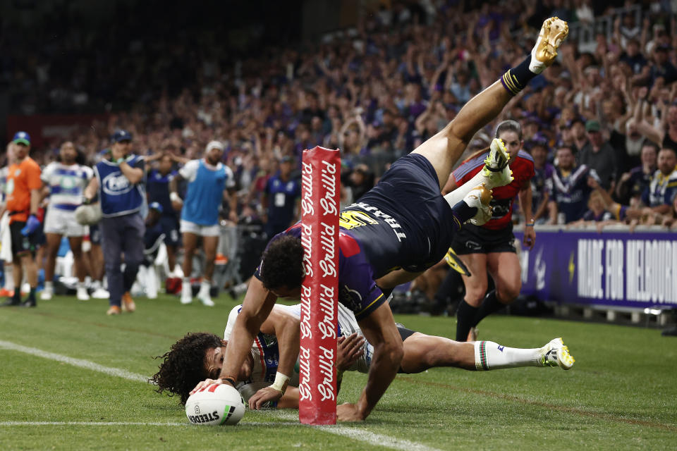 MELBOURNE, AUSTRALIA - MARCH 16: Xavier Coates of the Storm scores the match winning try during the round two NRL match between Melbourne Storm and New Zealand Warriors at AAMI Park, on March 16, 2024, in Melbourne, Australia. (Photo by Daniel Pockett/Getty Images)