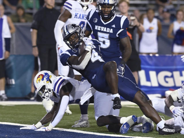 Neal runs for 3 TDs, Hinshaw Jr. adds runs for another to help Kansas beat  Nevada 31-24