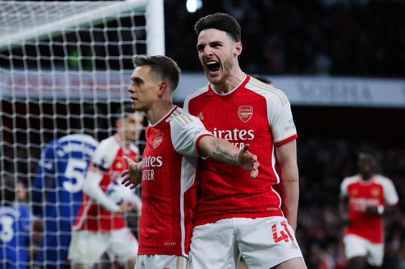 Arsenal players celebrate opening goal against Chelsea