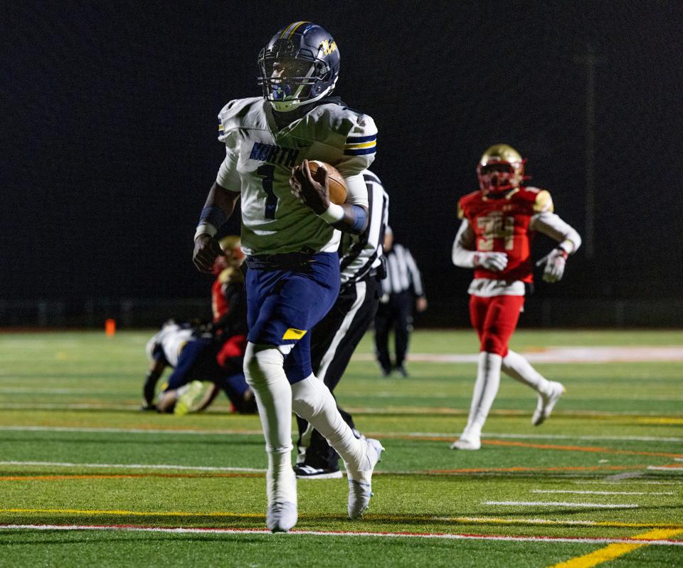 TRN Micah Ford takes in a first half touchdown. Toms River North football defeats Edison in NJSIAA Group 5 semifinal game in Marlton, NJ on November 19, 2022. 