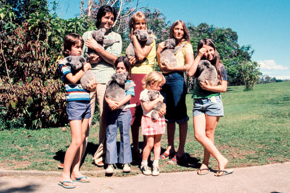 <p>Cuddling koalas in Brisbane, Australia, in 1975.</p>