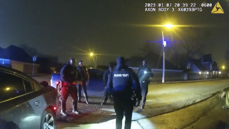 The image from video released on Jan. 27, 2023, by the City of Memphis, shows police officers talking after a brutal attack on Tyre Nichols on Jan. 7, 2023, in Memphis, Tenn. Nichols died on Jan. 10. The five officers have since been fired and charged with second-degree murder and other offenses. (City of Memphis via AP)