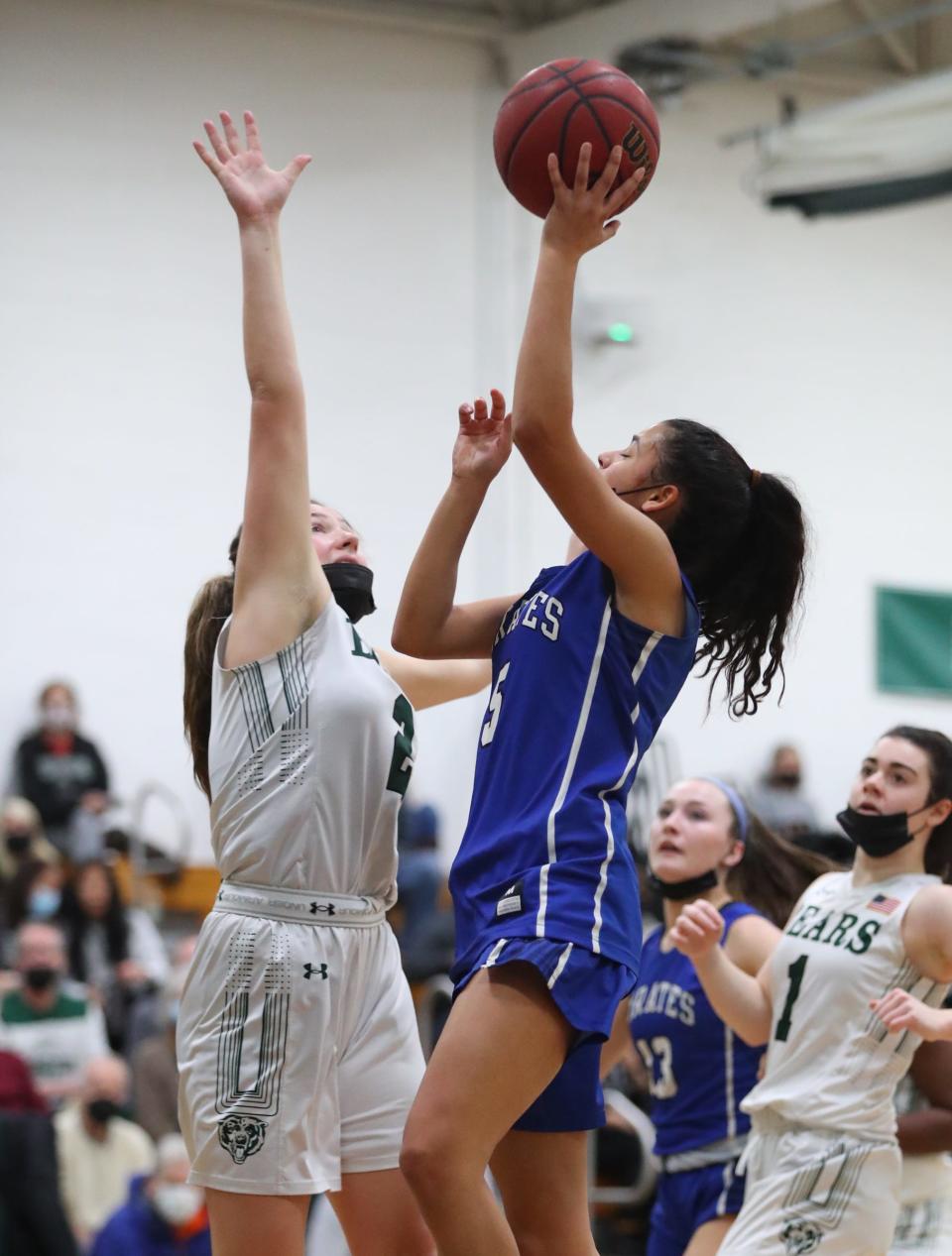 Pearl River's Mady Moroney (5) drives on Brewster's Grace Galgano (2) during  the opening round of Section 1 Class A playoffs at Brewster High School on Saturday, February 19, 2022. 