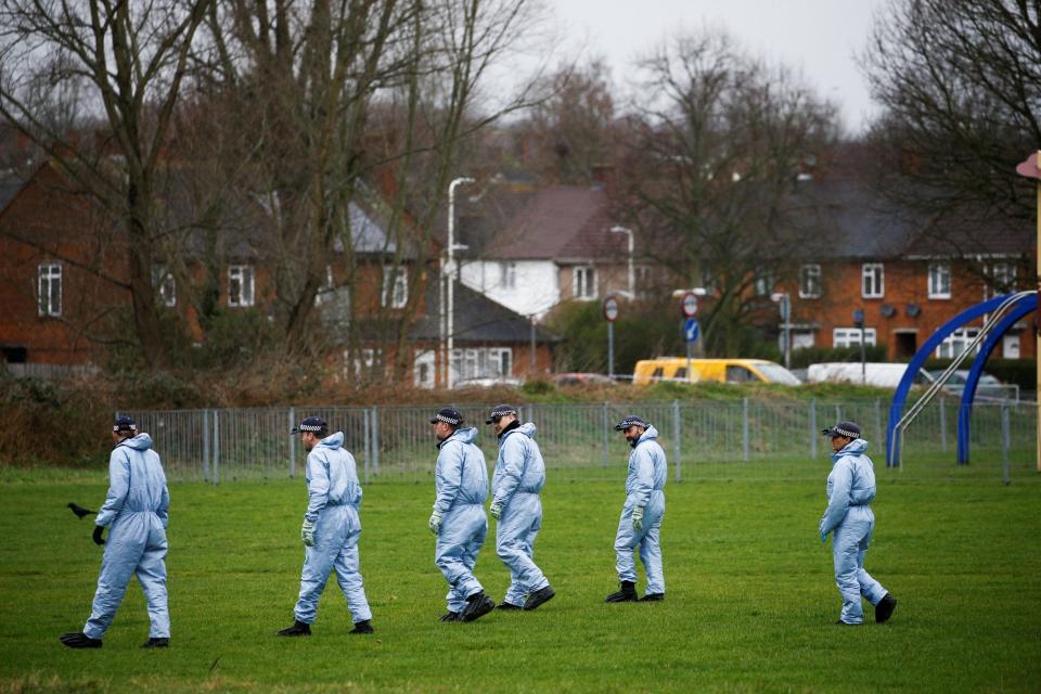 Police forensics officers searching the area near to where 17-year-old Jodie Chesney was stabbed (REUTERS)