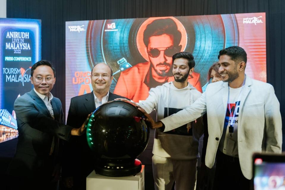 The launch of the concert trailer and officiating the kickstart. From second left: Effi Arpan, Tuan Syed Yahya Syed Othman, Anirudh and Edwin. — Picture by Devan Manuel.