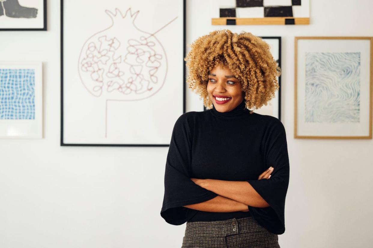 woman standing in an art gallery