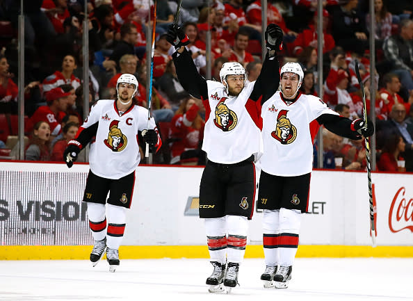 DETROIT, MI – APRIL 03: Fredrik Claesson #33 of the Ottawa Senators celebrates his third period goal with Mark Stone #61 and Erik Karlsson #65 while playing the Detroit Red Wings at Joe Louis Arena on April 3, 2017 in Detroit, Michigan. Detroit won the game 5-4 in a shootout. (Photo by Gregory Shamus/Getty Images)