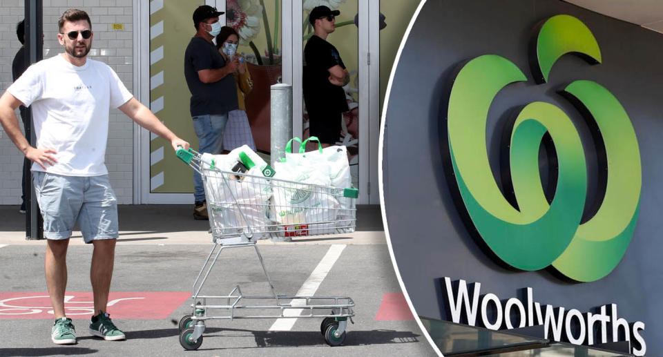 A man stands with a Woolworths trolley 