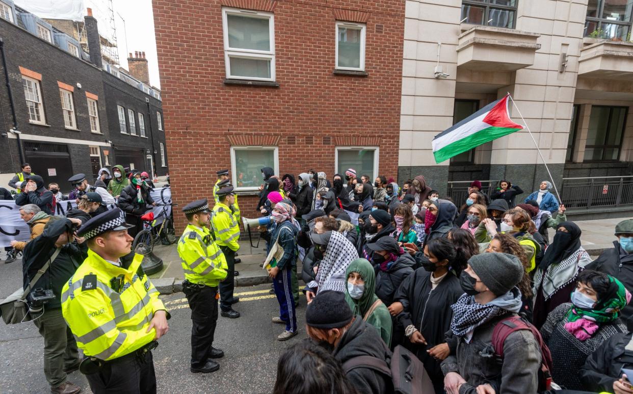 Pro-Palestinian protesters clash with police officers