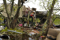 A home is so damaged it will not be able to receive power once it is restored, in the aftermath of Hurricane Ida in Dulac, La., Friday, Sept. 17, 2021. (AP Photo/Gerald Herbert)