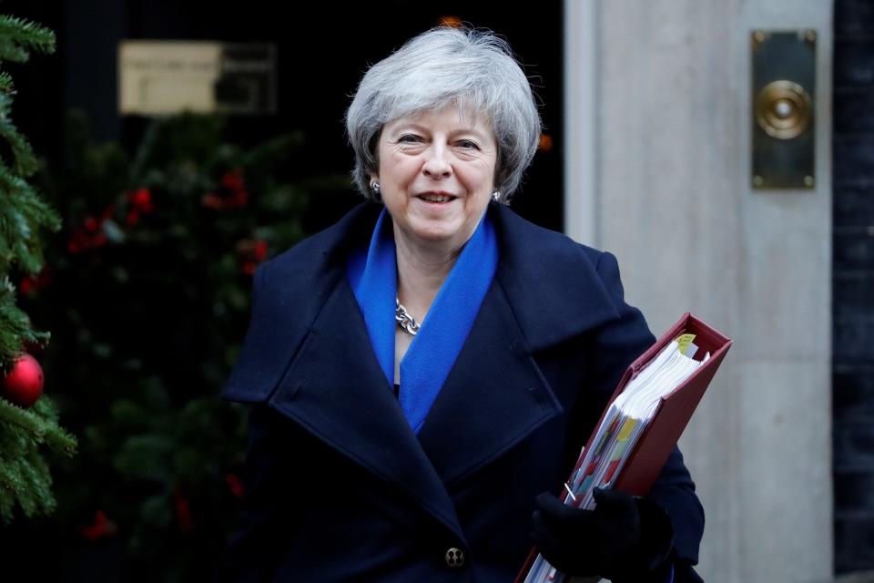 Theresa May leaves from 10 Downing Street in central London on December 19, 2018 before heading to the House of Commons to attend the weekly Prime Minister's Questions (AFP/Getty Images)