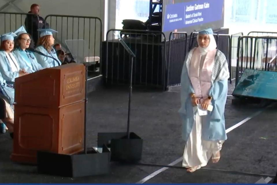 A stone-faced Maliha Fairooz walked the stage with her handcuffed hands in front of her. Columbia University