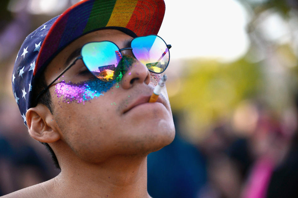 A participant smokes a cigarette at the LA Pride Music Festival and Parade 2017 on June 10, 2017 in West Hollywood, California. (Photo by Chelsea Guglielmino/Getty Images) (Photo: Chelsea Guglielmino via Getty Images)