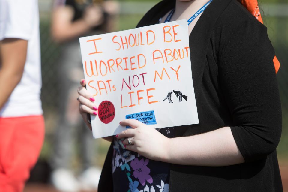 Brandywine High School students walk around the track during a walkout in protest of gun violence Thursday, June 2, 2022. 