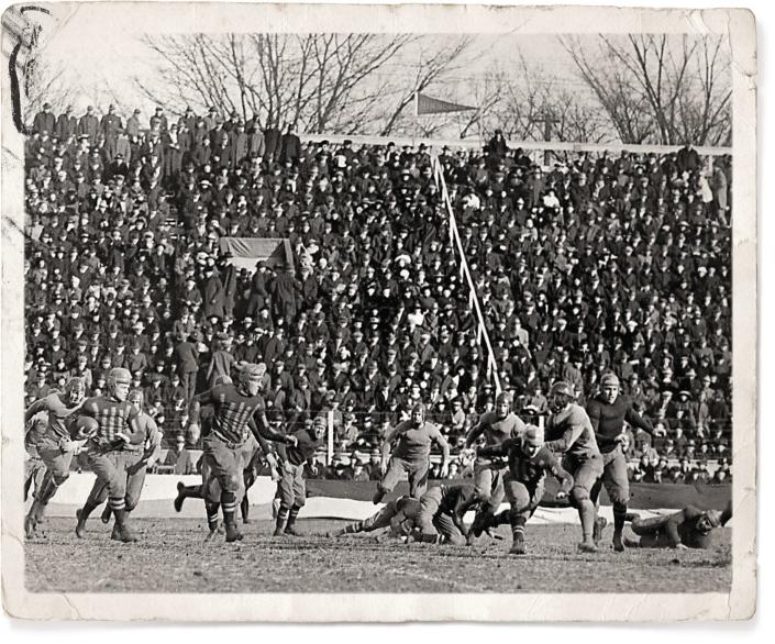 Chic Harley, with ball, led Ohio State to a 23-3 victory over Northwestern at Ohio Field that wrapped up the Western Conference — now the Big Ten — title for the Buckeyes in 1916.