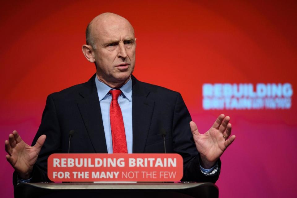 Shadow Housing Secretary John Healey addresses delegates at the annual Labour Party conference in Liverpool. (Getty/Leon Neal)