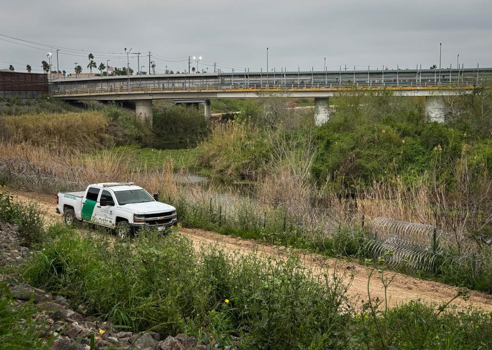 A Border Patrol officer patrols the banks of the Rio Grande in Brownsville Wednesday February 28, 2024.