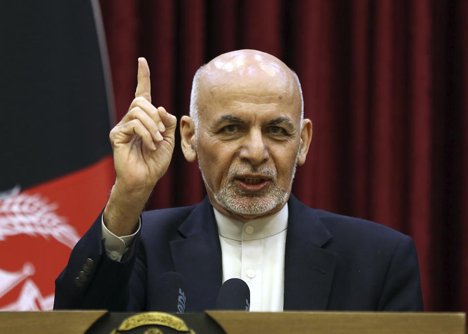 Afghan President Ashraf Ghani speaks during a news conference at the presidential palace in Kabul, Afghanistan, Sunday, March, 1, 2020. Ghani said Sunday he won't be releasing the 5,000 prisoners the Taliban say must be freed before intra-Afghan negotiations can begin. (AP Photo/Rahmat Gul)