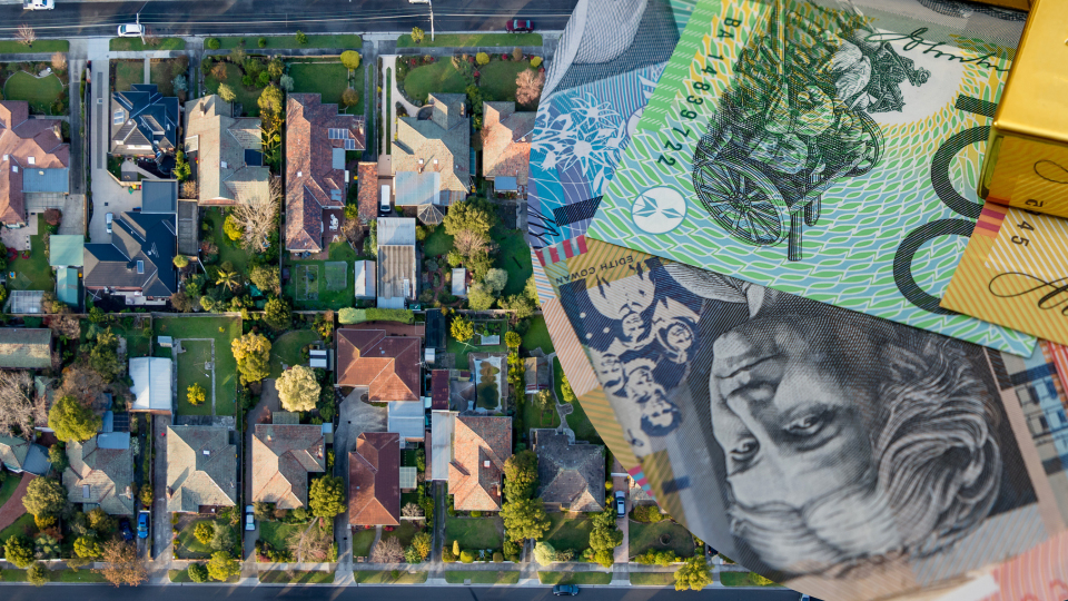 Pictured: Aerial view of Australian suburbs, Australian cash. Images: Getty