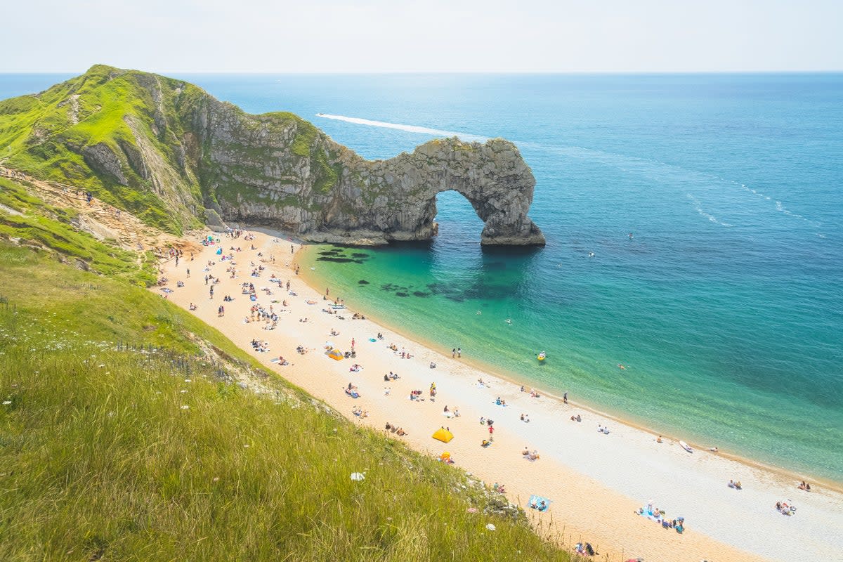 Durdle Door, with its iconic archway, is a great coastal spot for dogs (Getty Images/iStockphoto)