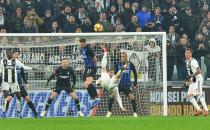 Juventus' Cristiano Ronaldo performs an acrobatic kick during the Serie A soccer match between Juventus and Inter Milan at the Turin Allianz stadium, Italy, Friday, Dec. 7, 2018. (Andrea Di Marco/ANSA via AP)