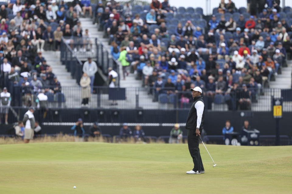 Tiger Woods of the US misses a putt on the 2nd green during the second round of the British Open golf championship on the Old Course at St. Andrews, Scotland, Friday July 15, 2022. The Open Championship returns to the home of golf on July 14-17, 2022, to celebrate the 150th edition of the sport's oldest championship, which dates to 1860 and was first played at St. Andrews in 1873. (AP Photo/Peter Morrison)