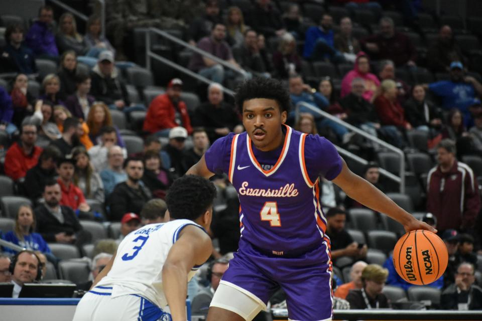 Evansville freshman Chuck Bailey III dribbles during the Missouri Valley Conference tournament quarterfinals on Friday in St. Louis.
