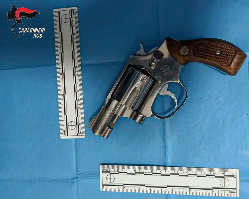 Carabinieri release photo of revolver found inside mafia boss hideout