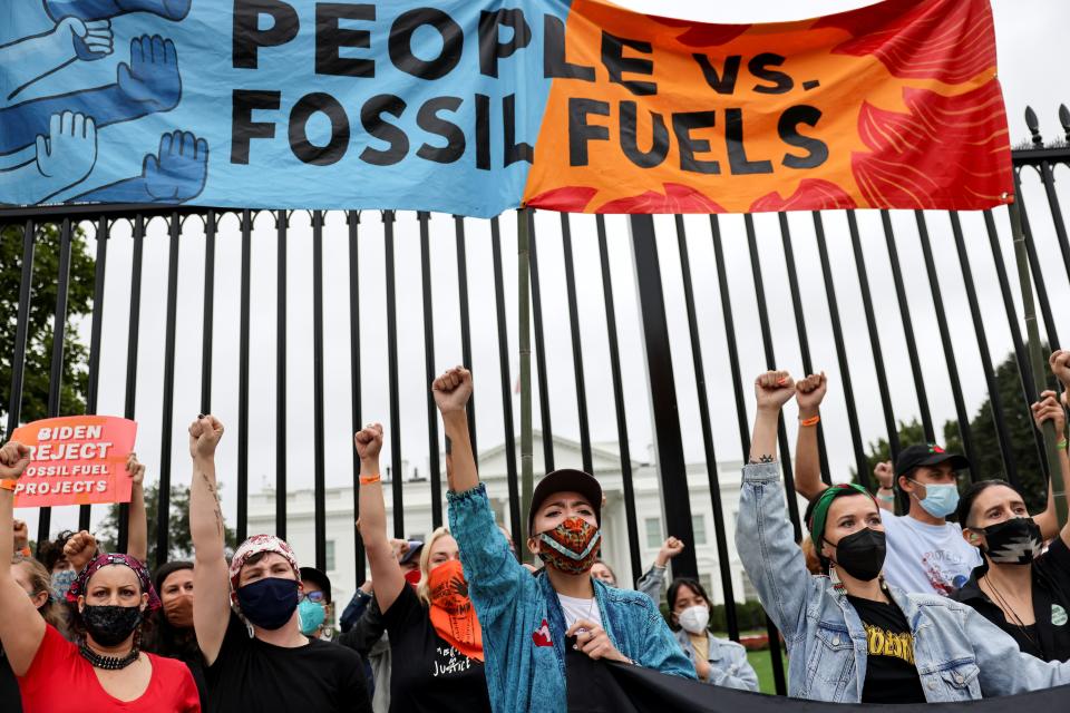 Indigenous activists march outside The White House protesting climate action (10/11/2021)