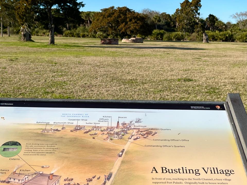 Beyond the signage at Fort Pulaski cisterns remain from the enslaved Workers Village.