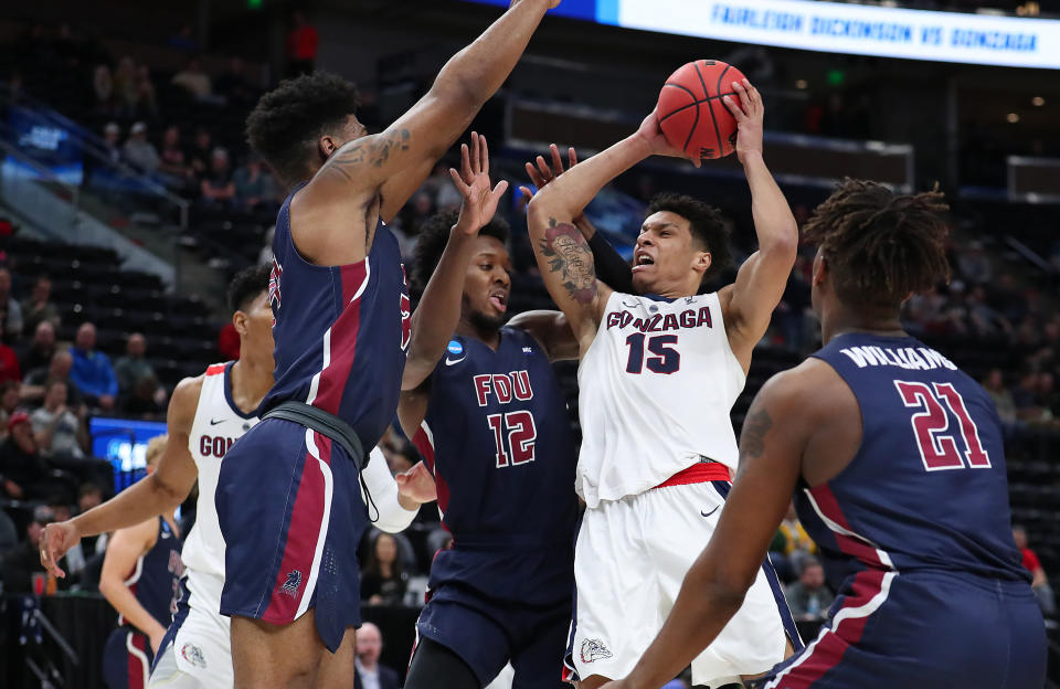 <p>Brandon Clarke #15 of the Gonzaga Bulldogs goes up for a shot against Kaleb Bishop #12 of the Fairleigh Dickinson Knights during the first half in the first round of the 2019 NCAA Men’s Basketball Tournament at Vivint Smart Home Arena on March 21, 2019 in Salt Lake City, Utah. </p>