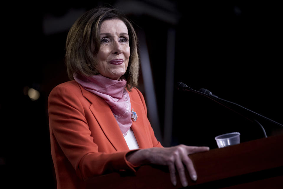 FILE - In this April 24, 2020, file photo House Speaker Nancy Pelosi of Calif., takes a question from a reporter during a news conference on Capitol Hill in Washington. Pelosi shelved a proposal for proxy voting this week after Republicans objected. (AP Photo/Andrew Harnik, File)