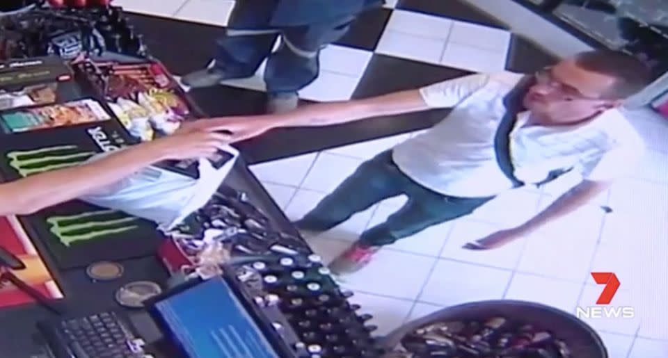 Allibrand is captured on camera buying alcohol for a teenager he later raped. Source: 7 News