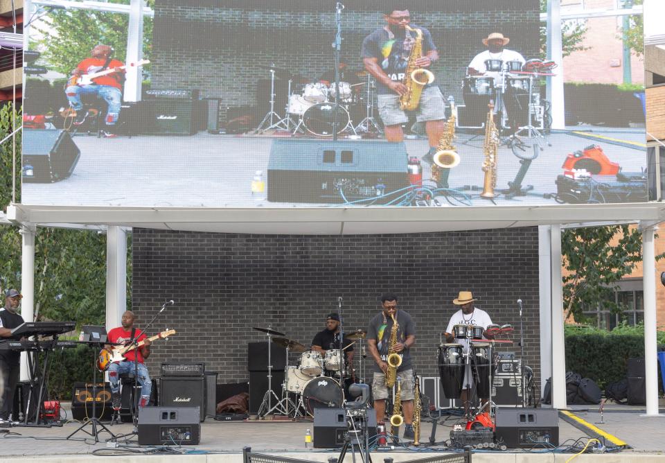 The Robert Johnson Project performs at the Downtown Canton Music Fest.