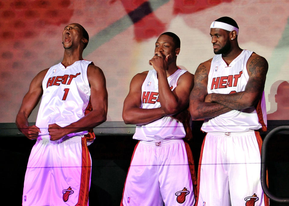 MIAMI - JULY 09:  Chris Bosh #1, Dwyane Wade #3, and LeBron James #6 of the Miami Heat are introduced to fans during a welcome party at American Airlines Arena on July 9, 2010 in Miami, Florida.  (Photo by Doug Benc/Getty Images)