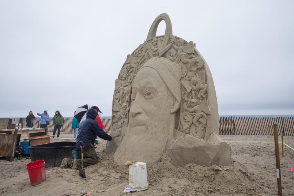 Abe Waterman of Prince Edward Island carves "Dave is Here."