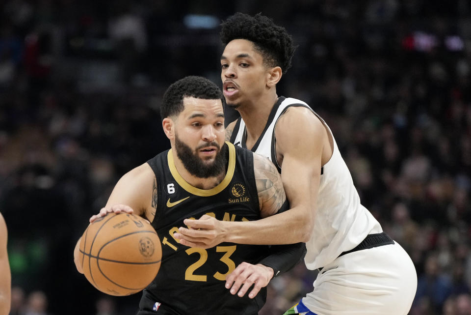 Minnesota Timberwolves forward Josh Minott (8) fouls Toronto Raptors guard Fred VanVleet (23) during the first half of an NBA basketball game, in Toronto, Saturday, March 18, 2023. (Frank Gunn/The Canadian Press via AP)