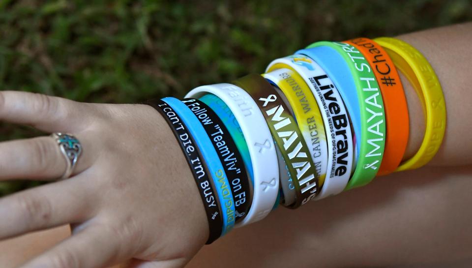 8-year-old Vivian Sleeth of Rockledge was diagnosed with DIPG, a rare pediatric brain-stem tumor. Doctors gave her six to nine months to live. That was 17 months ago. She wears about 20 bracelets, most in memory of children who have died from DIPG.