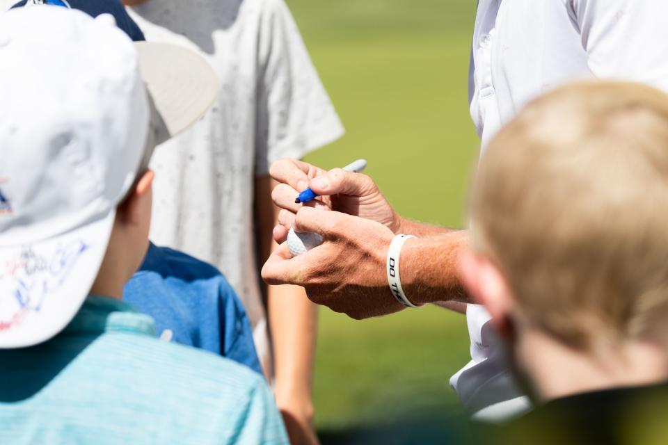 Carson Lundell, of Alpine, signs autographs after finishing the 18th hole during the Utah Championship, part of the PGA Korn Ferry Tour, at Oakridge Country Club in Farmington on Sunday, Aug. 6, 2023. | MEGAN NIELSEN, Megan Nielsen, Deseret News