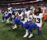 <p>Buffalo Bills players take a knee during the national anthem before the first half of an NFL football game between the Atlanta Falcons and the Buffalo Bills, Sunday, Oct. 1, 2017, in Atlanta. (AP Photo/John Bazemore) </p>