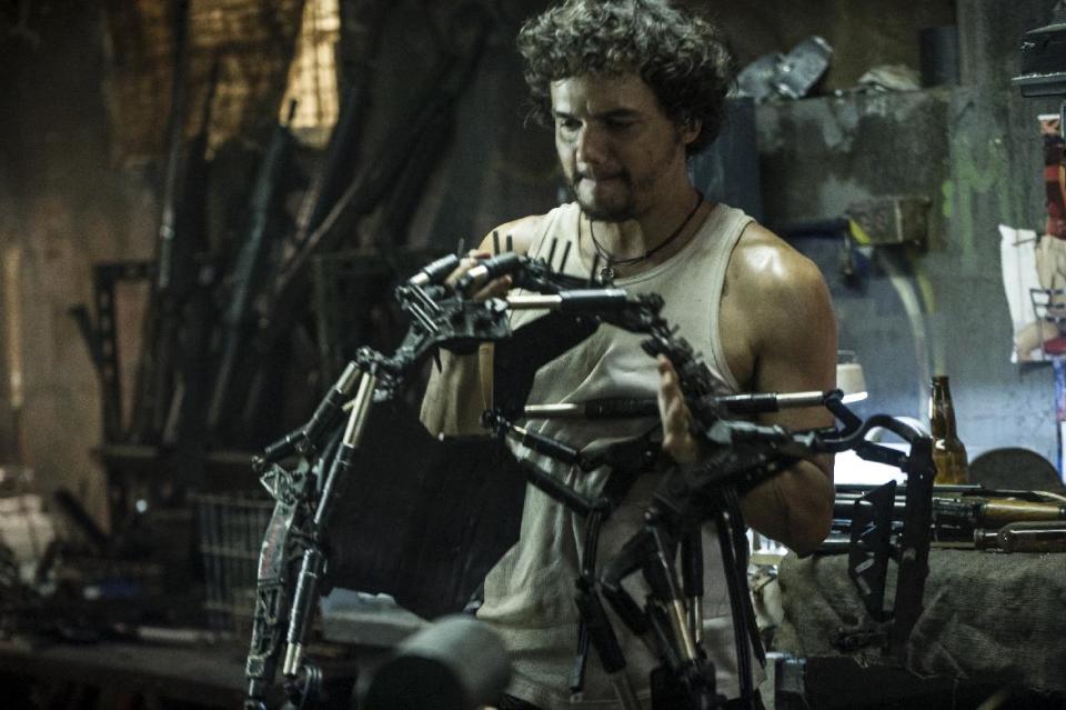 This film publicity image released by TriStar, Columbia Pictures-Sony shows Wagner Moura in a scene from "Elysium." (AP Photo/TriStar, Columbia Pictures - Sony, Kimberley French)