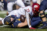 Washington State defensive end Willie Taylor III (27) sacks California quarterback Chase Garbers (7) in the first quarter of an NCAA college football game in Berkeley, Calif., Saturday, Oct. 2, 2021. (AP Photo/John Hefti)