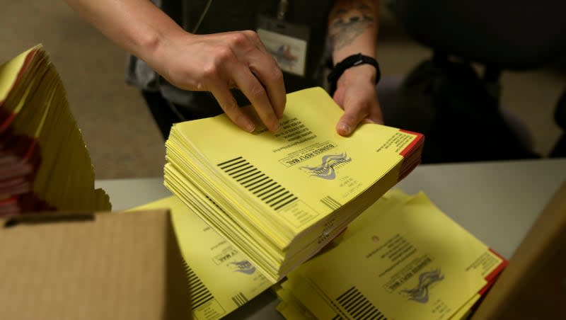 Caitlin Mullen organizes primary ballots at the Salt Lake County Government Center in Salt Lake City on Thursday, July 2, 2020. Audits have shown that Utah’s elections are clean.