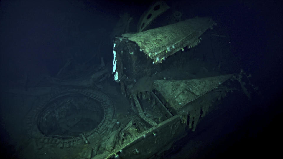 In this Oct. 7, 2019 image taken from underwater video provided by Vulcan Inc., the Japanese aircraft carrier Kaga is shown in the Pacific Ocean off Midway Atoll in the Northwestern Hawaiian Islands. Deep-sea explorers scouring the world's oceans for sunken World War II ships are honing in on a debris field deep in the Pacific. Weeks of grid searches around the Northwestern Hawaiian Islands already have led the research vessel the Petrel to one sunken battleship, the Kaga, and it's investigating this week what could be another. (Vulcan Inc. via AP)