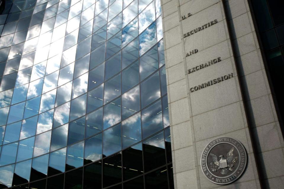 The U.S. Securities and Exchange Commission seal hangs on the facade of its building in Washington, D.C.