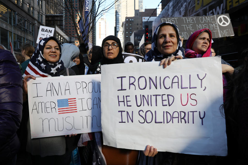 Women wearing U.S. flag hijabs are pictured during an "I am Muslim Too" rally in Times Square, Manhattan, New York, U.S. Feb. 19, 2017.