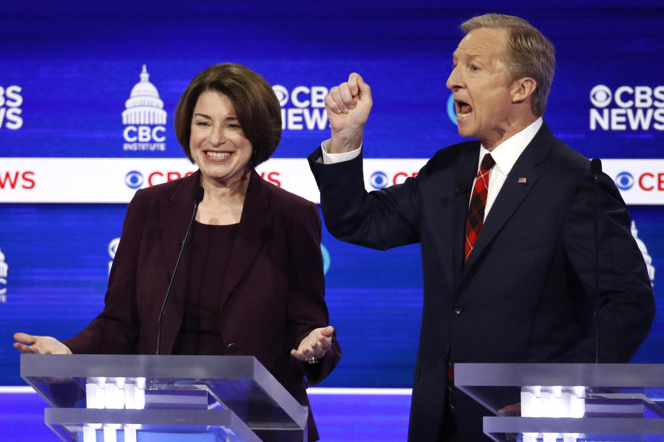 From left, Democratic presidential candidates, Sen. Amy Klobuchar, D-Minn., and businessman Tom Steyer, participate in a Democratic presidential primary debate at the Gaillard Center, Tuesday, Feb. 25, 2020, in Charleston, S.C., co-hosted by CBS News and the Congressional Black Caucus Institute. (AP Photo/Patrick Semansky)